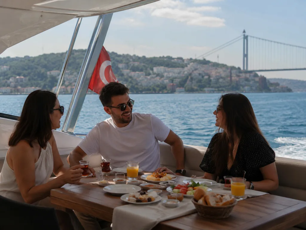 Bosphorus brunch cruise on a private yacht with a long table on deck