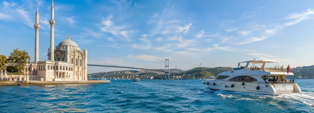 Morning Bosphorus cruise gliding on calm water at sunrise in Istanbul