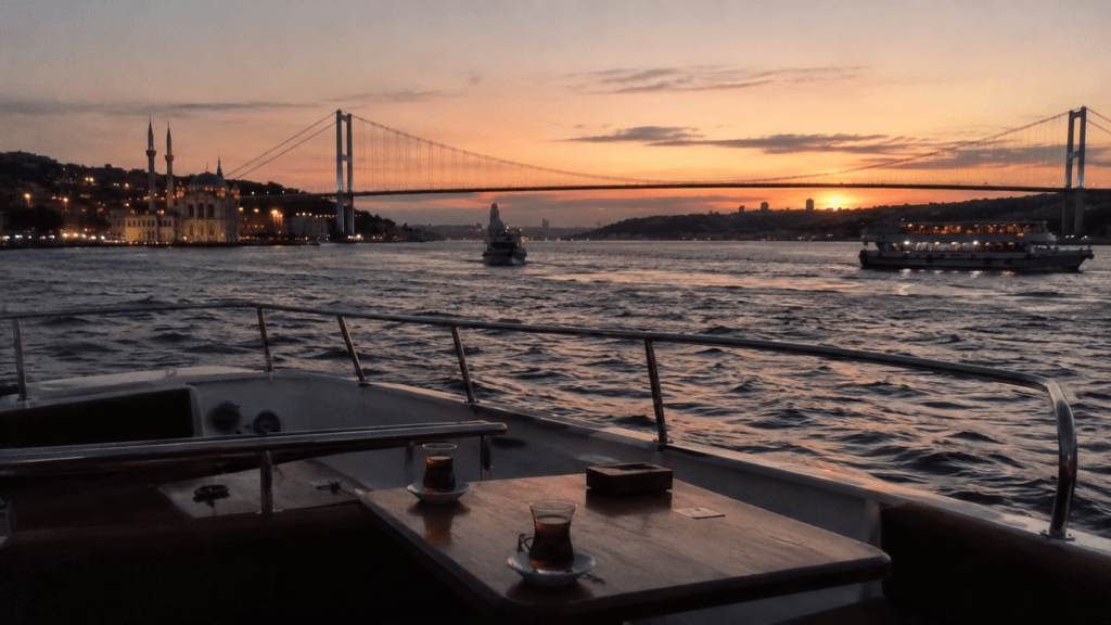 Istanbul Bosphorus sunset cruise with golden skies over the strait